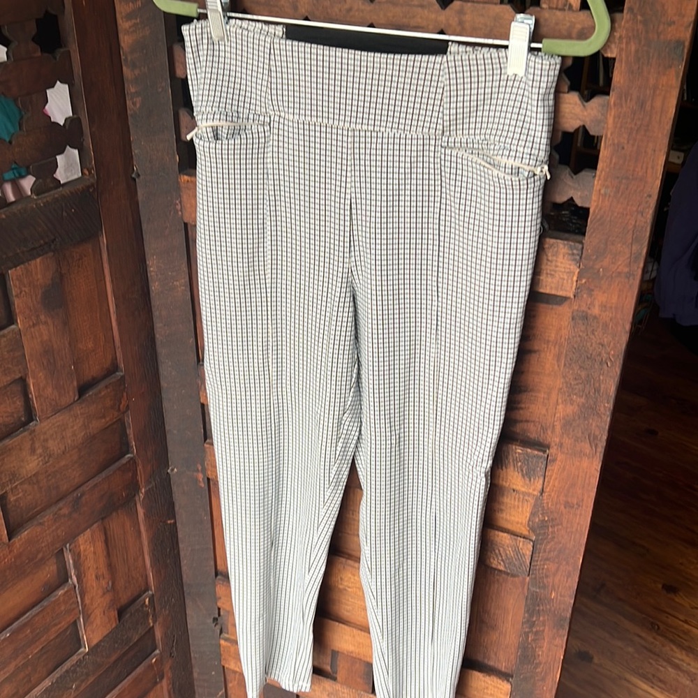 Blue and brown checkered stretchy pants.